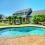 The Pros and Cons of Purchasing a Home with an In-Ground Pool